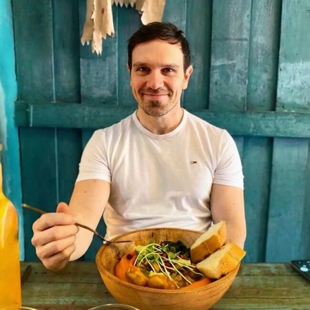 Justin planning a vegan trip